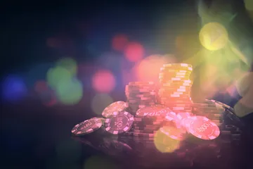 A laptop glowing with a bright login prompt in a minimalistic setup, symbolizing the protected access system at GGGJL.