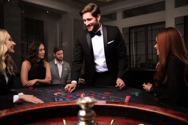 A person using their device against a moody casino-themed background, illustrating the smooth re-entry process at GGGJL.